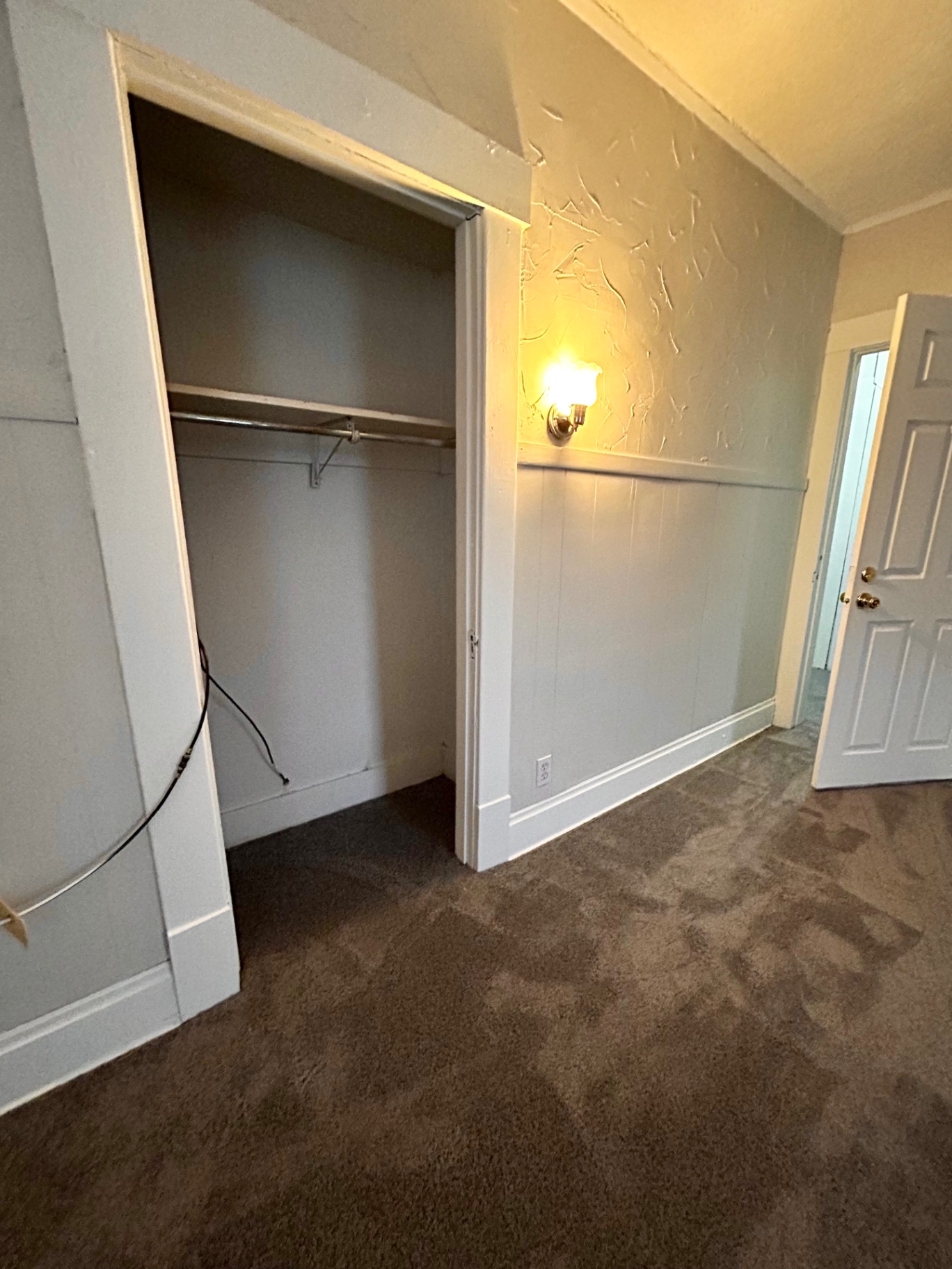68 E Patterson Ave. bedroom with large closet and wall sconce
