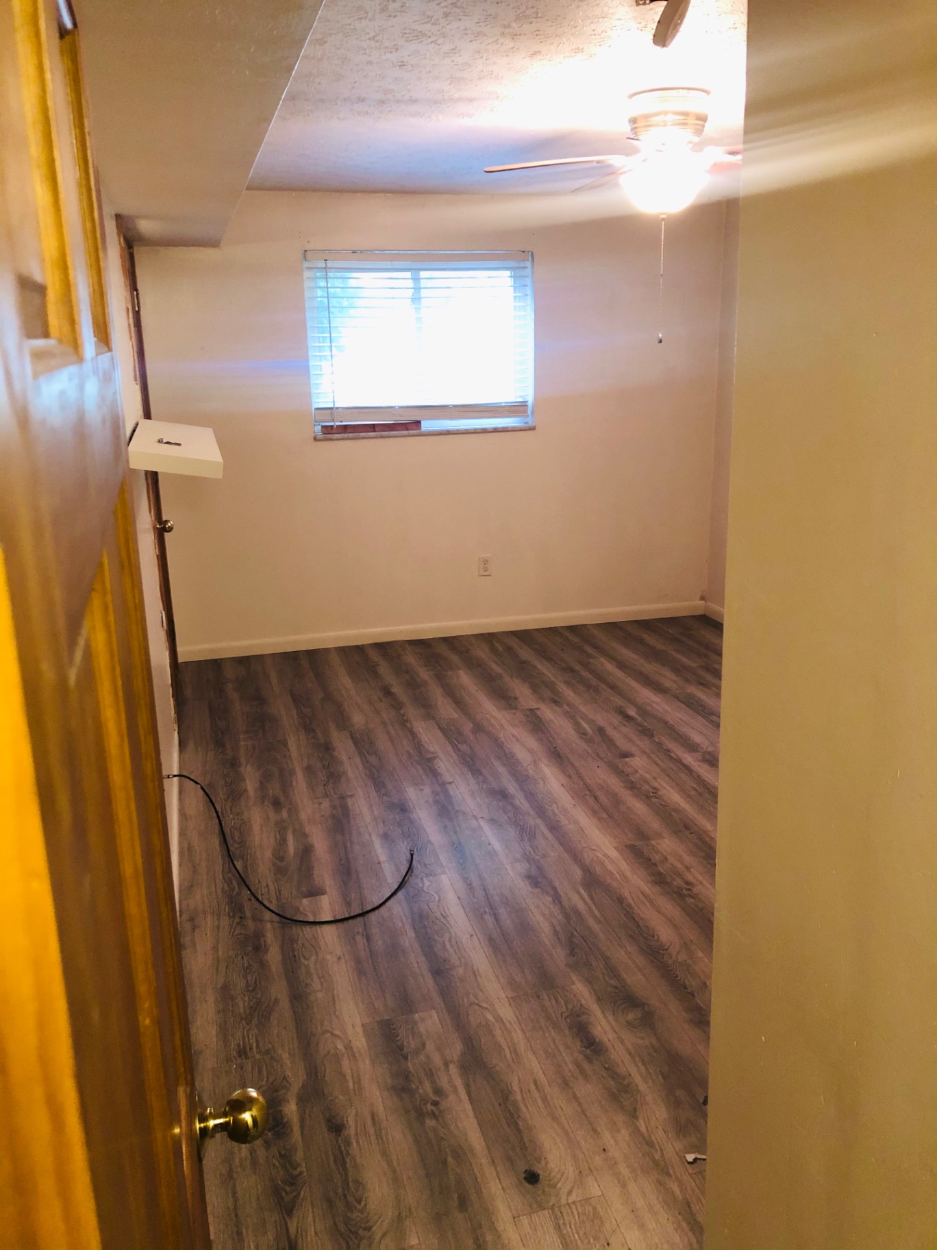 2150 N 4th St. Unit A second bedroom with ceiling fan and window
