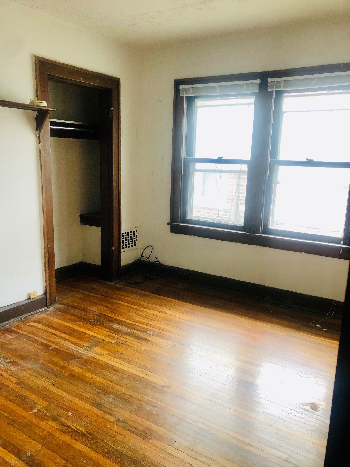 2155 N 4th St. bedroom with walk-in closet and hardwood floors