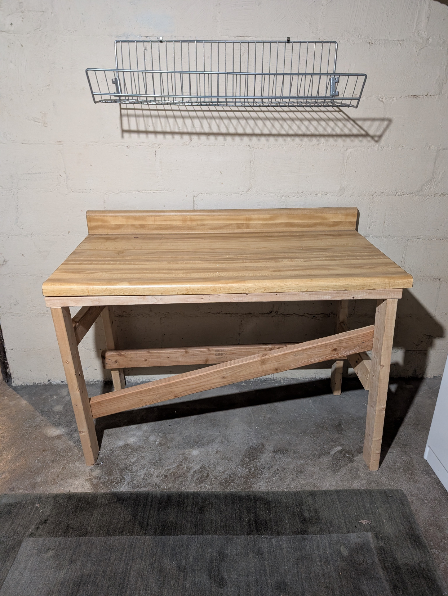3338 Chestnut shared laundry butcher-block folding bench with wire shelf above