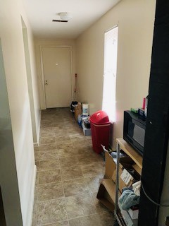 2026 Summit St. tiled entry hallway leading into the unit