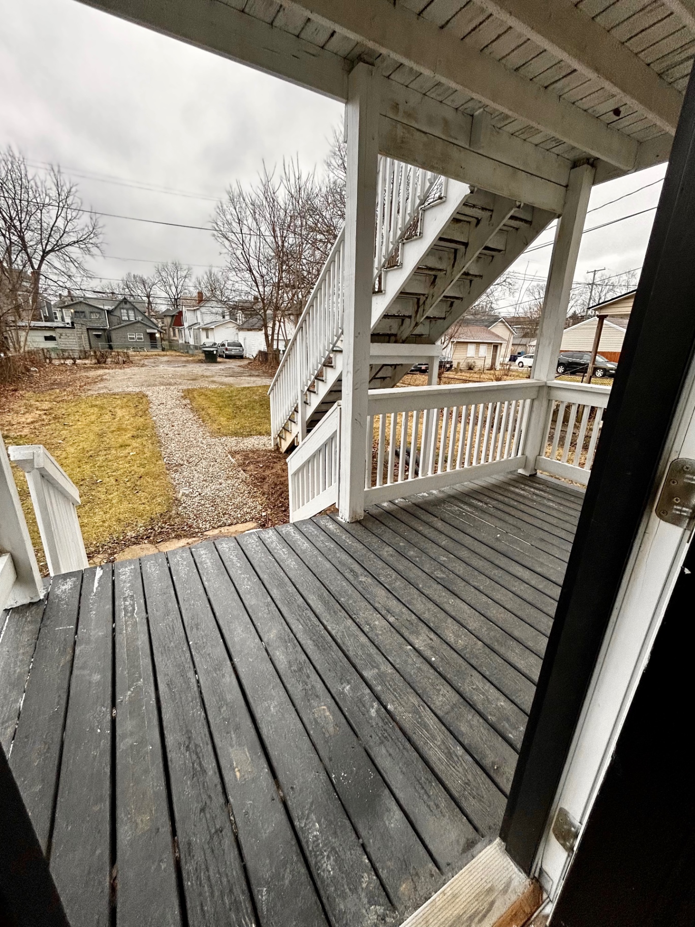 68 E Patterson Ave. covered back porch and stairway with backyard view
