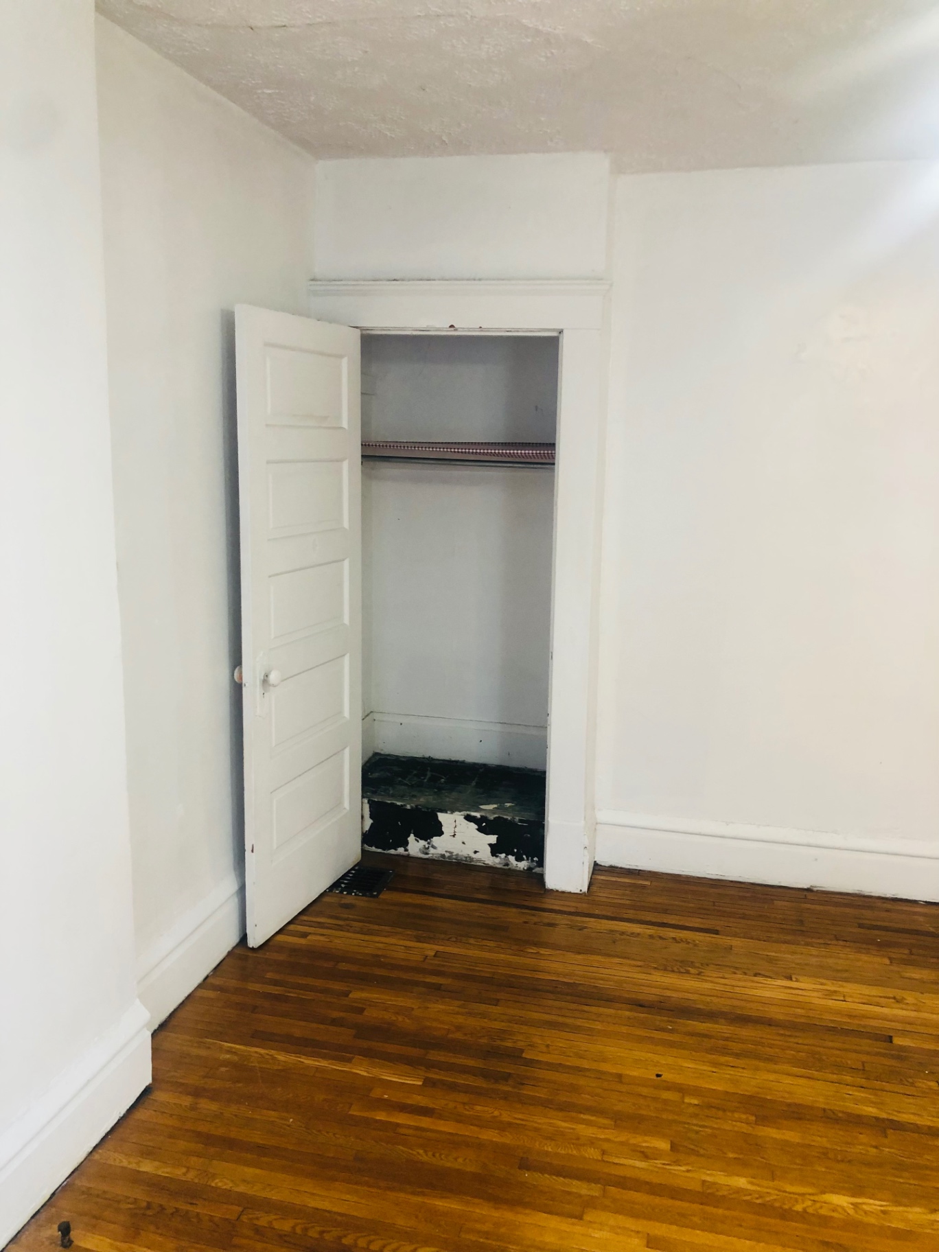 119 W 9th second bedroom closet with hardwood floors