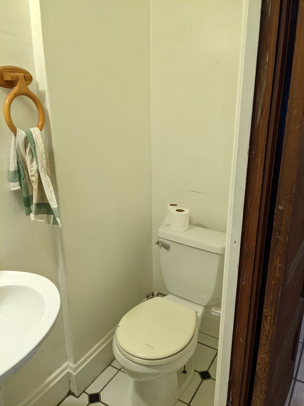 374 C E 14th Ave. bathroom with toilet, towel ring, and tile floor