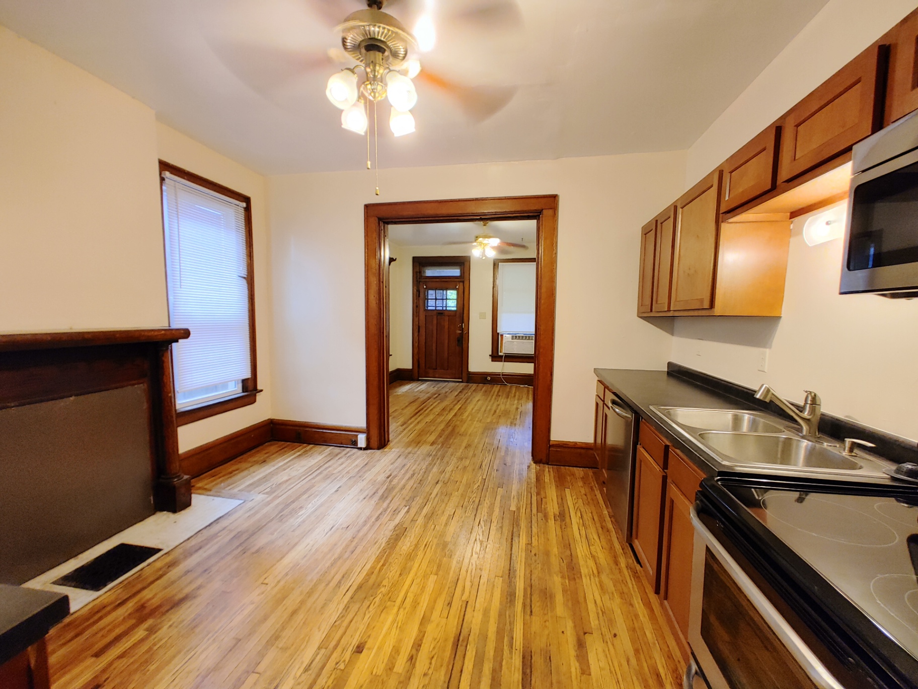 374 A E 14th Ave. dining area open to kitchen and front room with hardwood floors