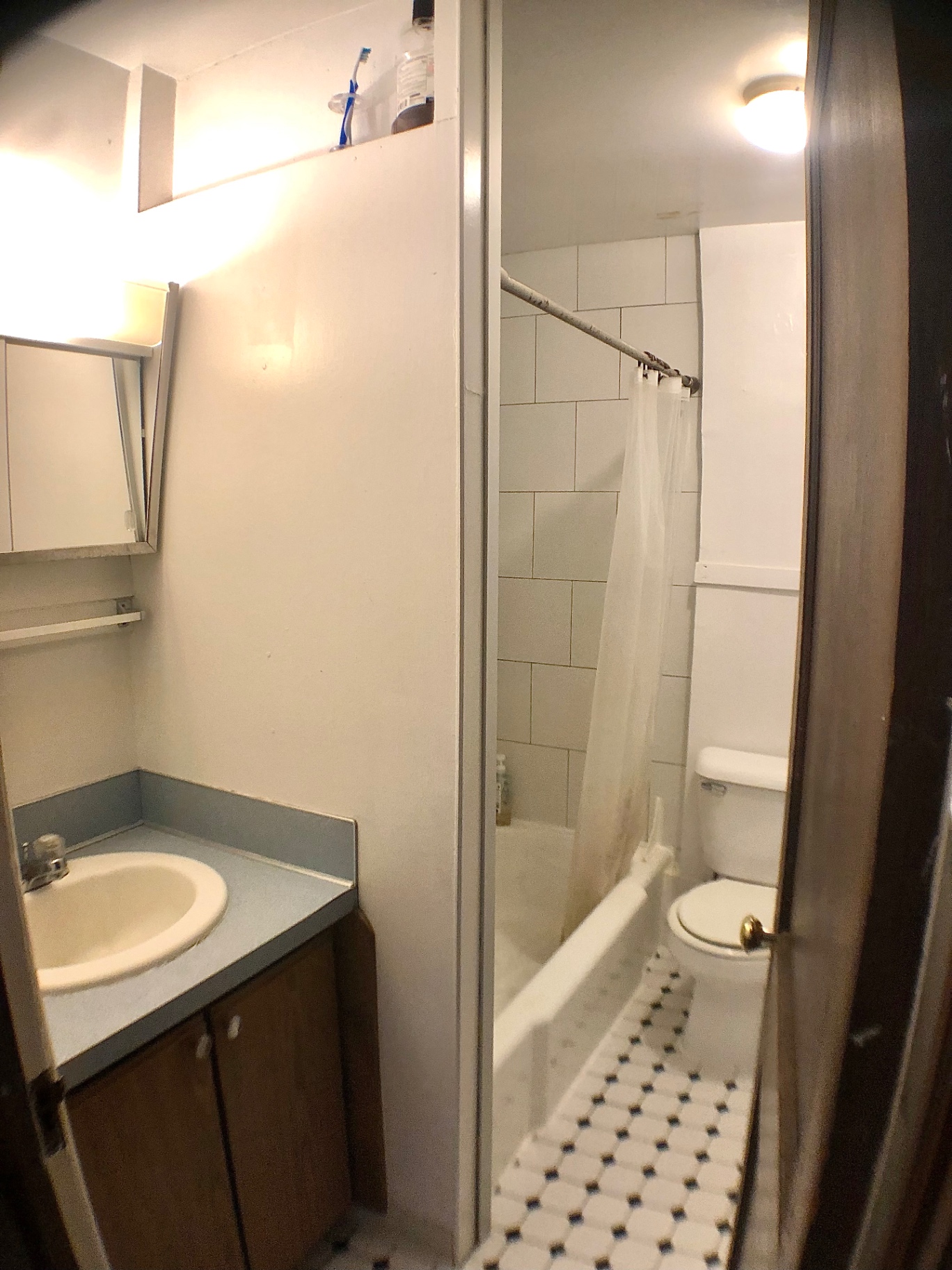 2054 Iuka Ave. D full bathroom with tub/shower, subway tile, and vintage hex tile floor