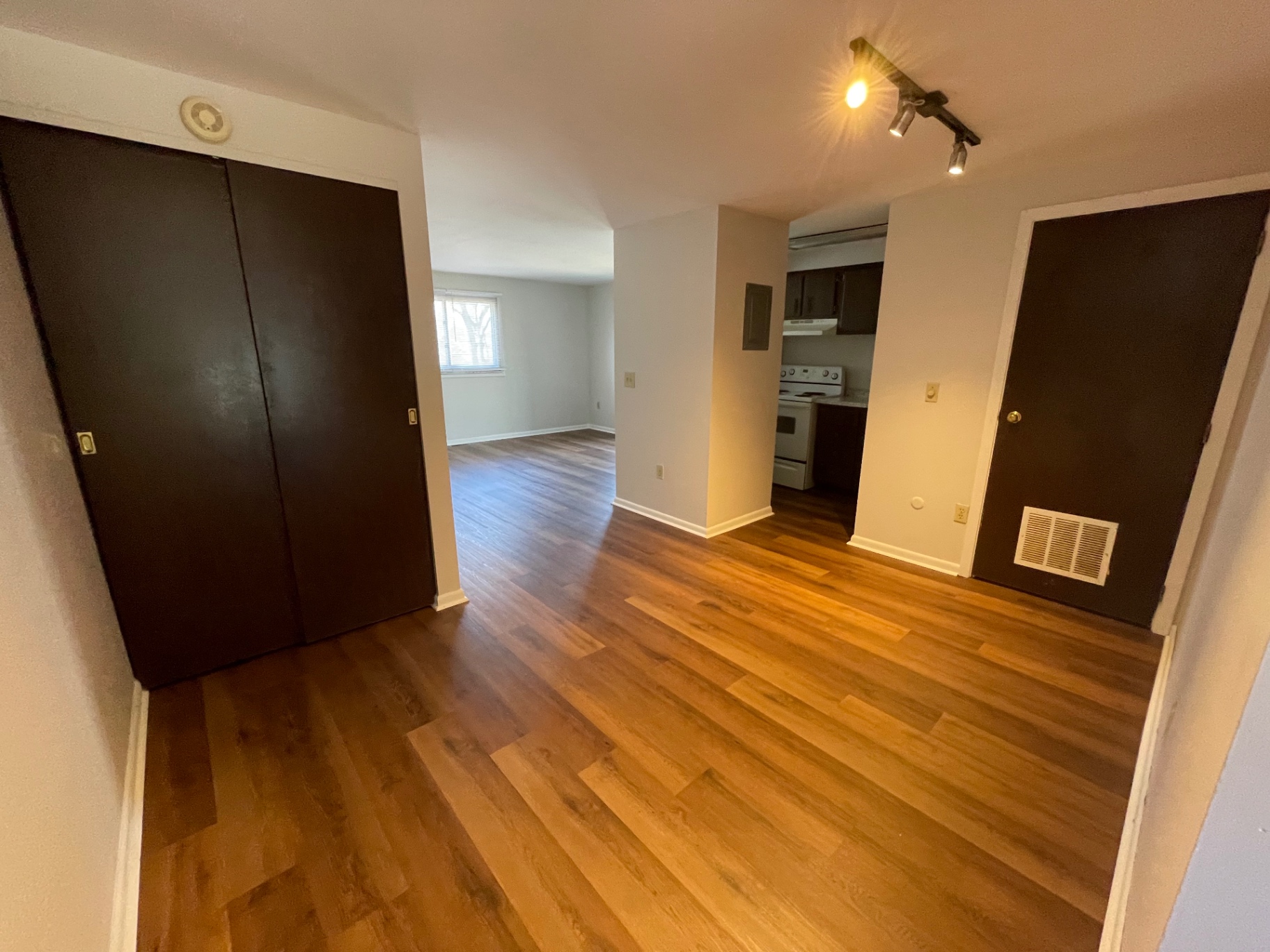 2020 Summit St. entry with coat closet and open sightline to the updated kitchen and living area