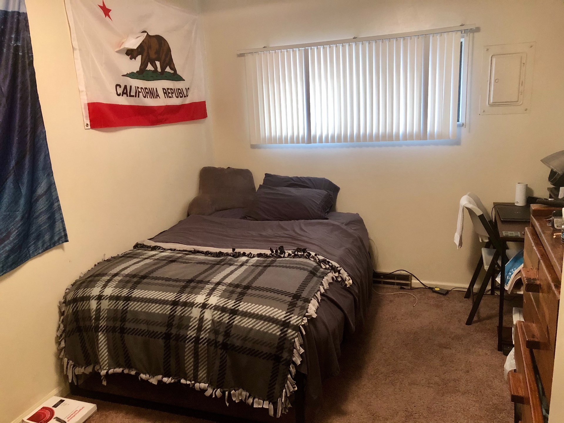 2024 Iuka Ave carpeted bedroom with large window