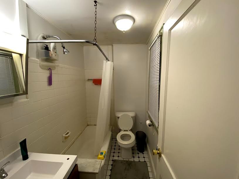 2054 Iuka Ave. B full bathroom with tub/shower, subway tile, and vintage hex tile floor