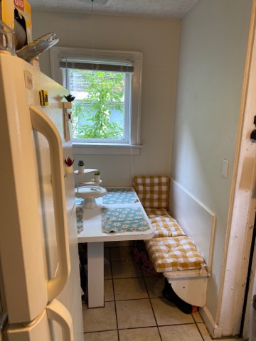 2155 N 4th St. breakfast nook with bench seating and window