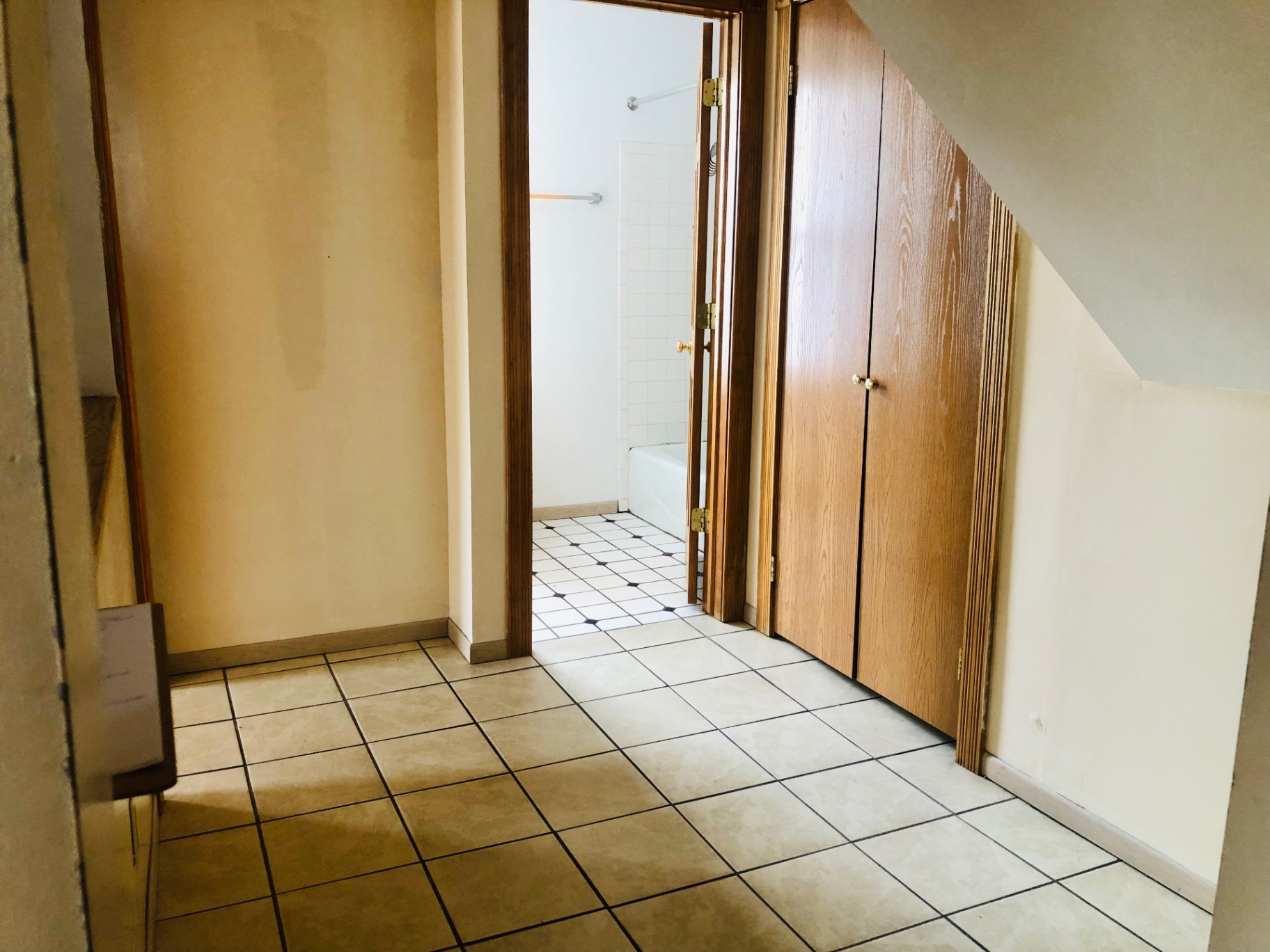 77 E Patterson Ave. tiled hallway with linen closet leading to the bathroom