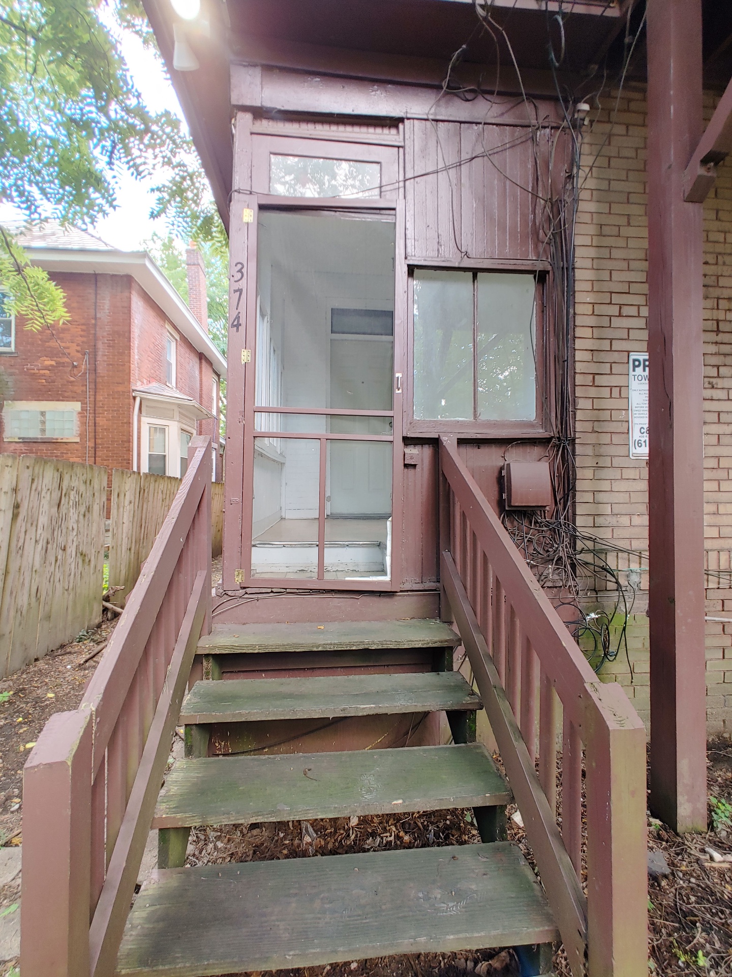 374 A E 14th Ave. private rear entry with wood stairs up to the screened porch door