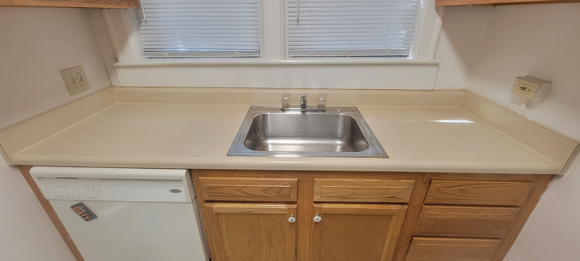 2054 Iuka Ave. A kitchen sink and countertop under double windows