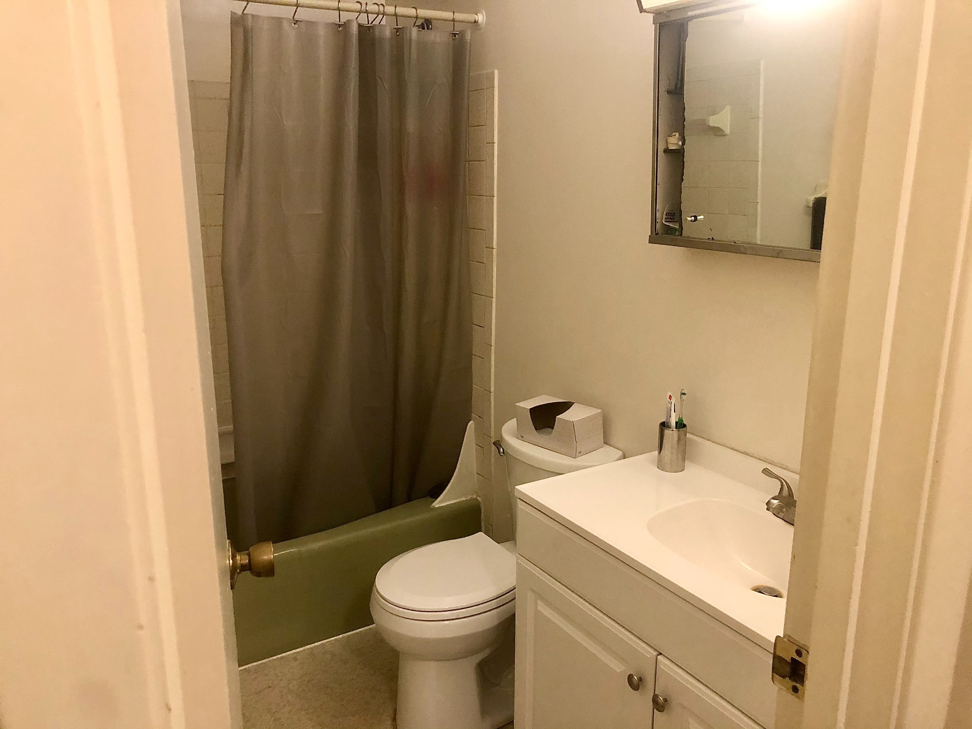 2024 Iuka Ave full bathroom with tub, shower, and vanity