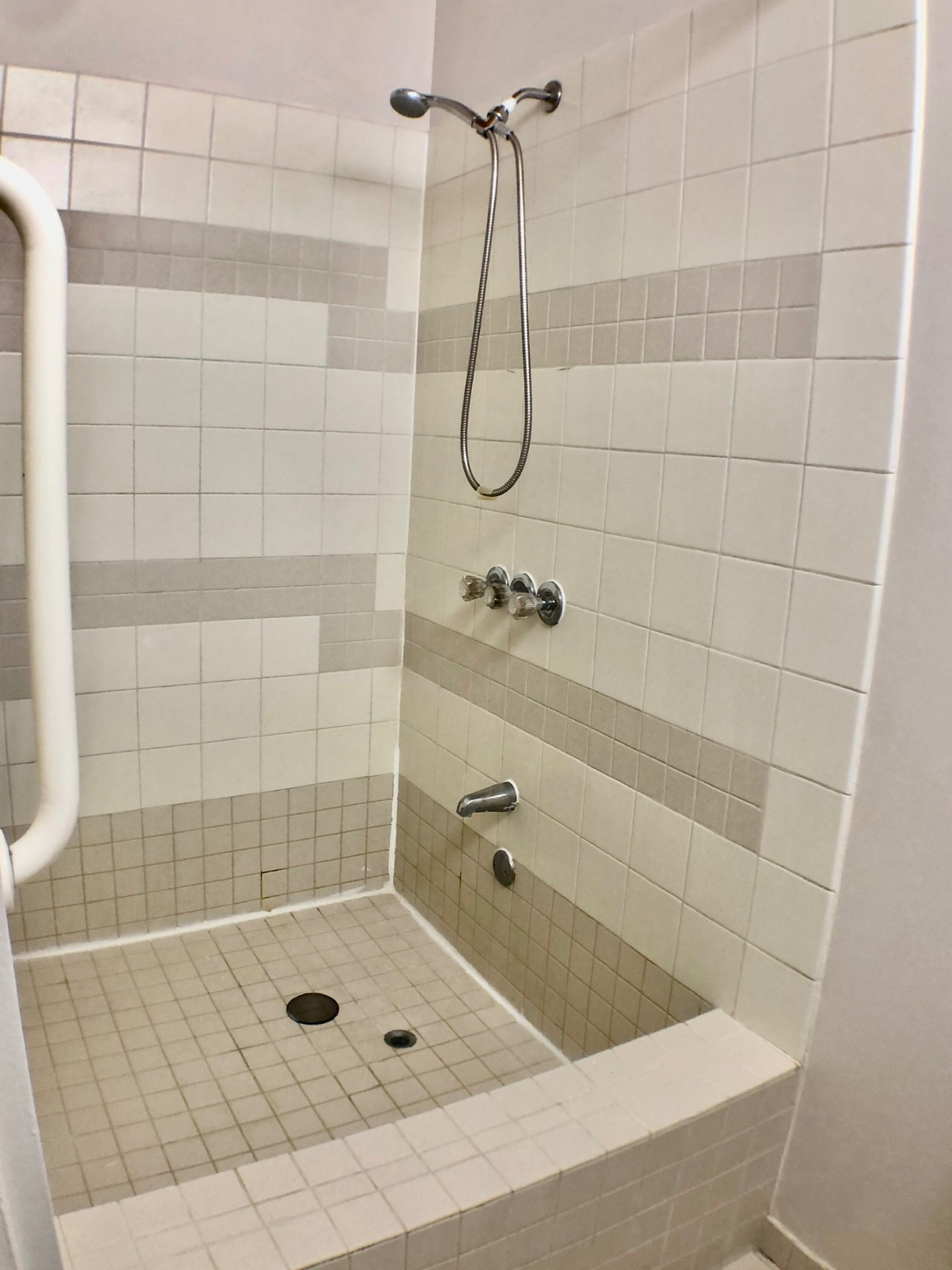 2040 Iuka Ave House tiled step-in shower with grab bar