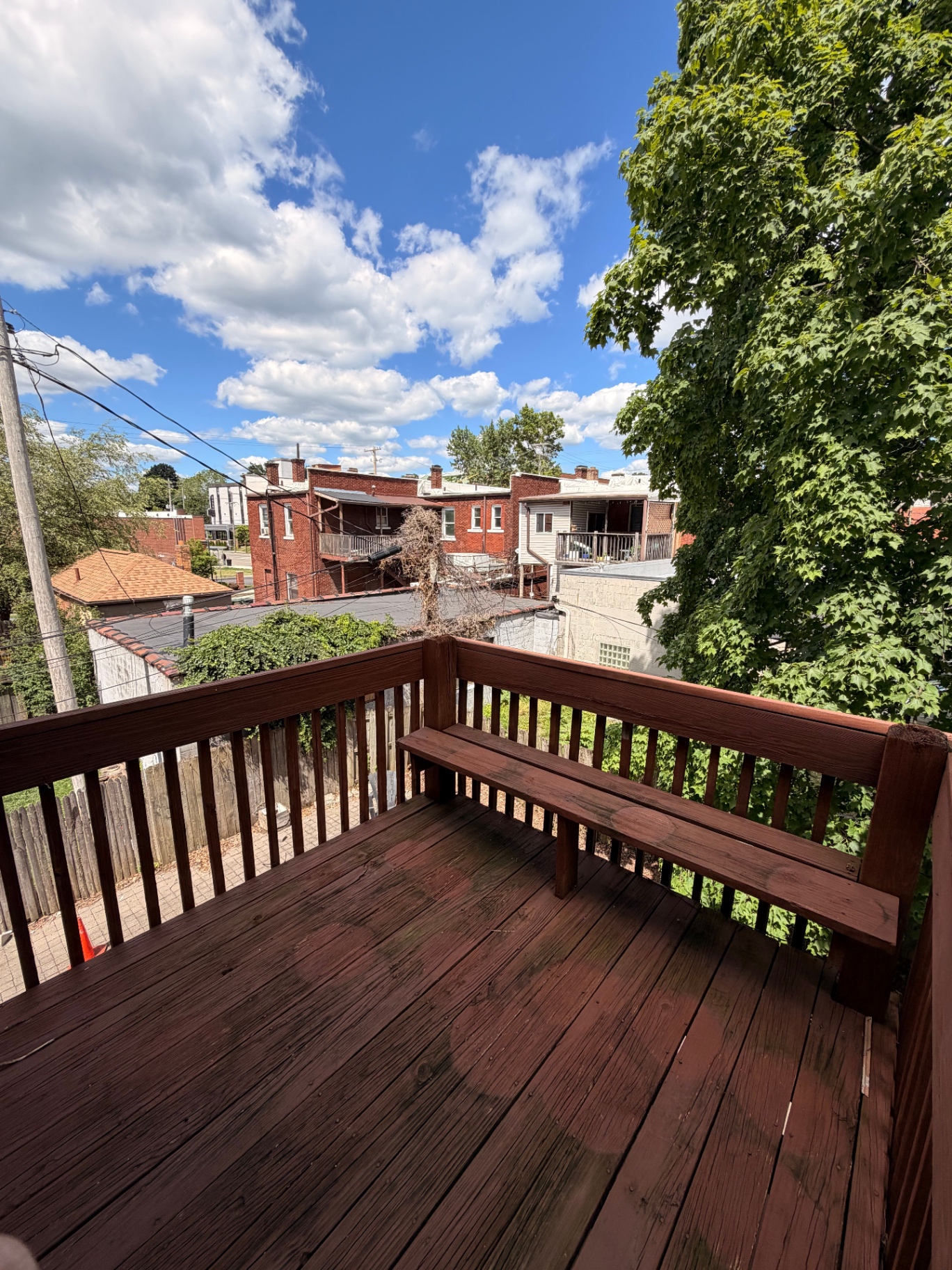 3340 Chestnut Upstairs private back deck with bench and treetop views over Clintonville