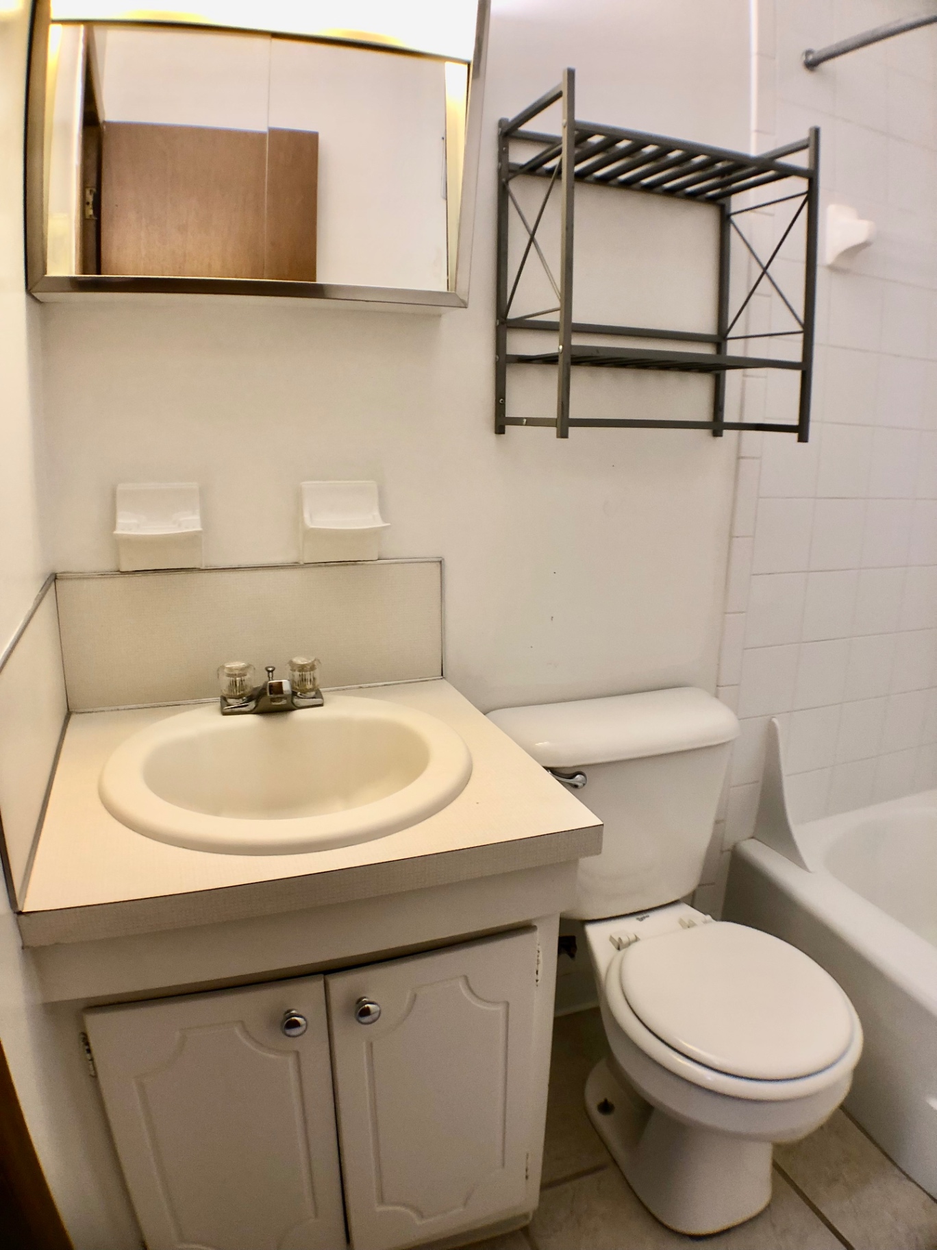 2040 Iuka Ave. 5A bathroom vanity with mirror and overhead storage rack