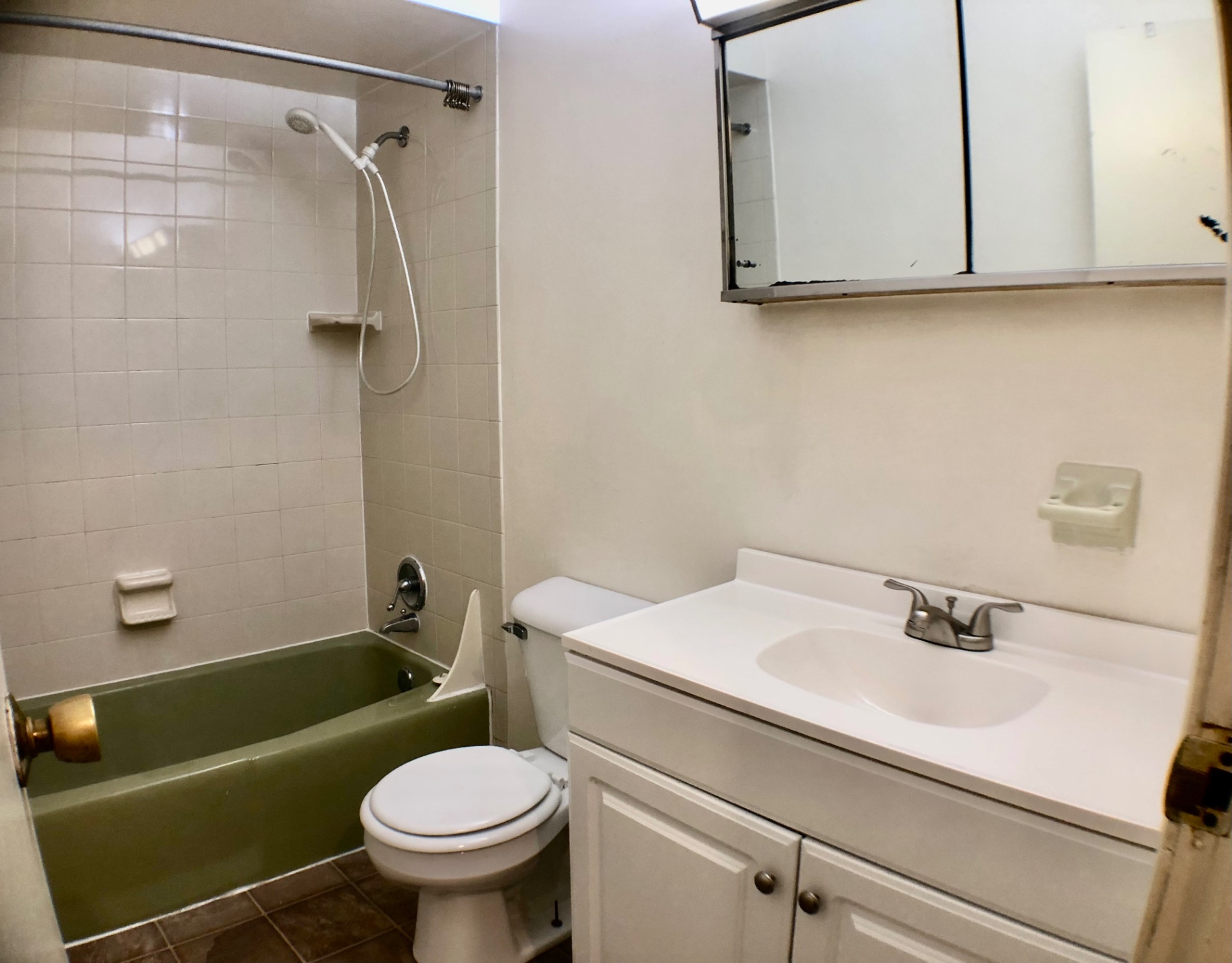 2018 Iuka Ave. bathroom with tub/shower combo, updated vanity, and medicine cabinet