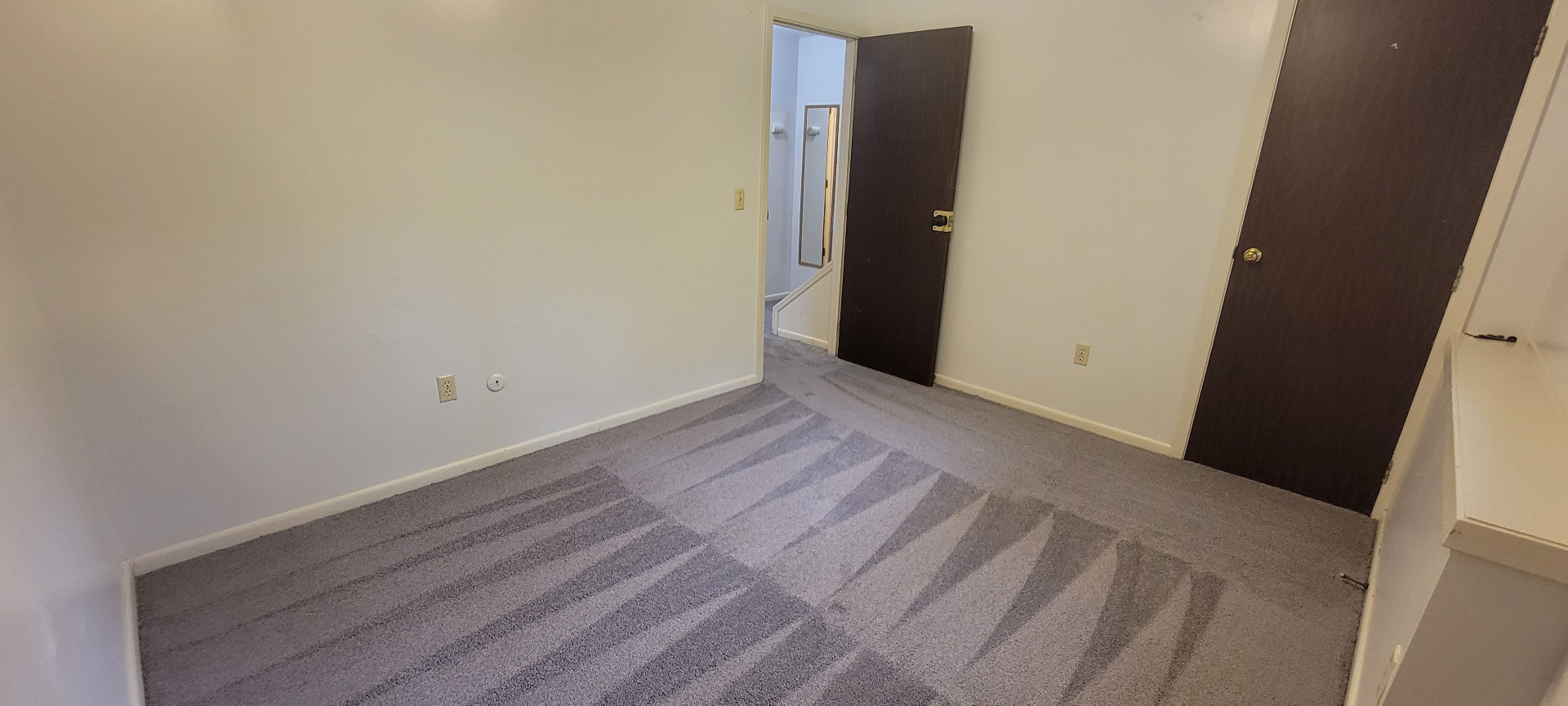 2024 Summit St. second carpeted bedroom with open doorway to the hall