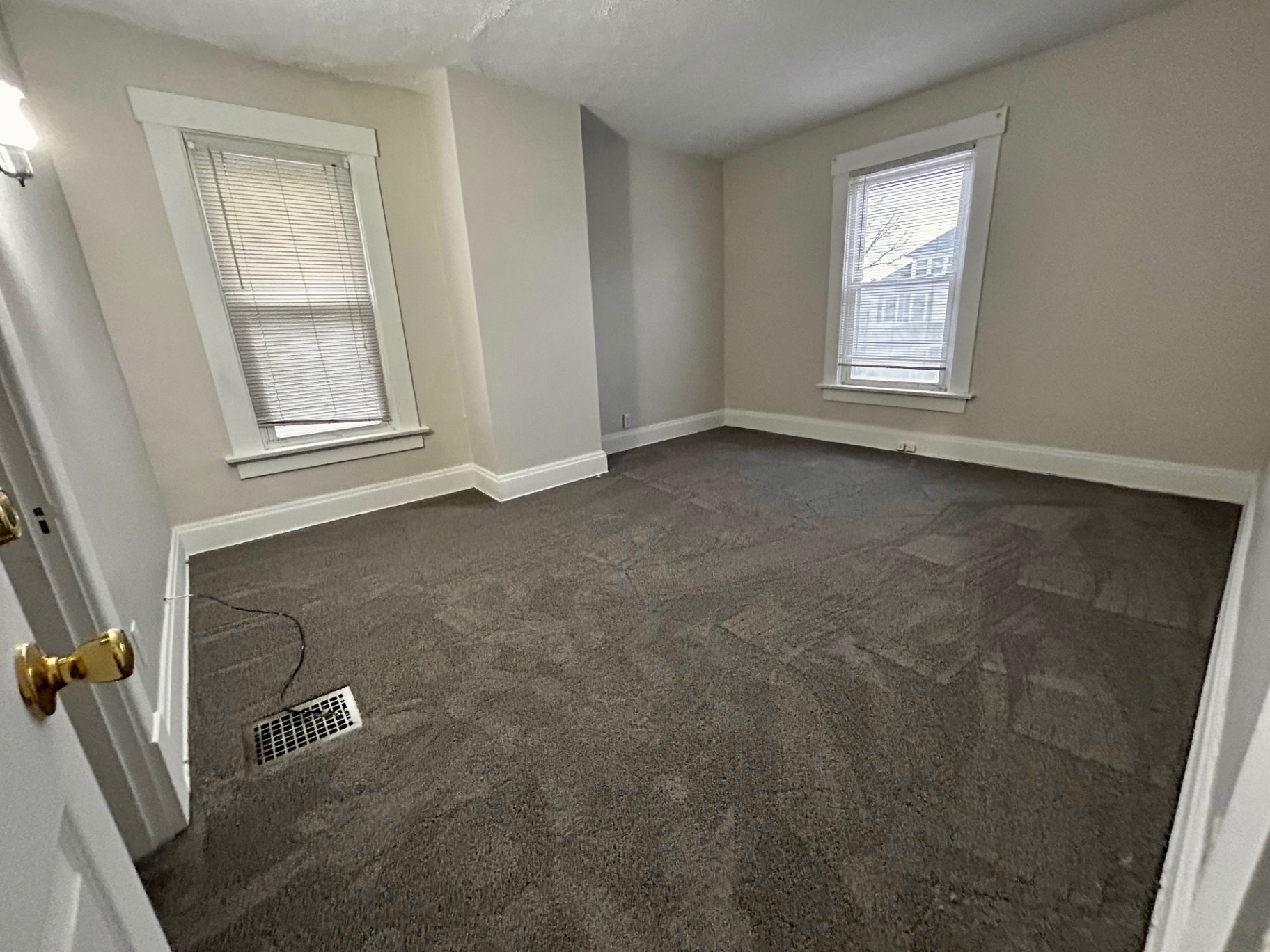 68 E Patterson Ave. bright bedroom with two windows and fresh carpet