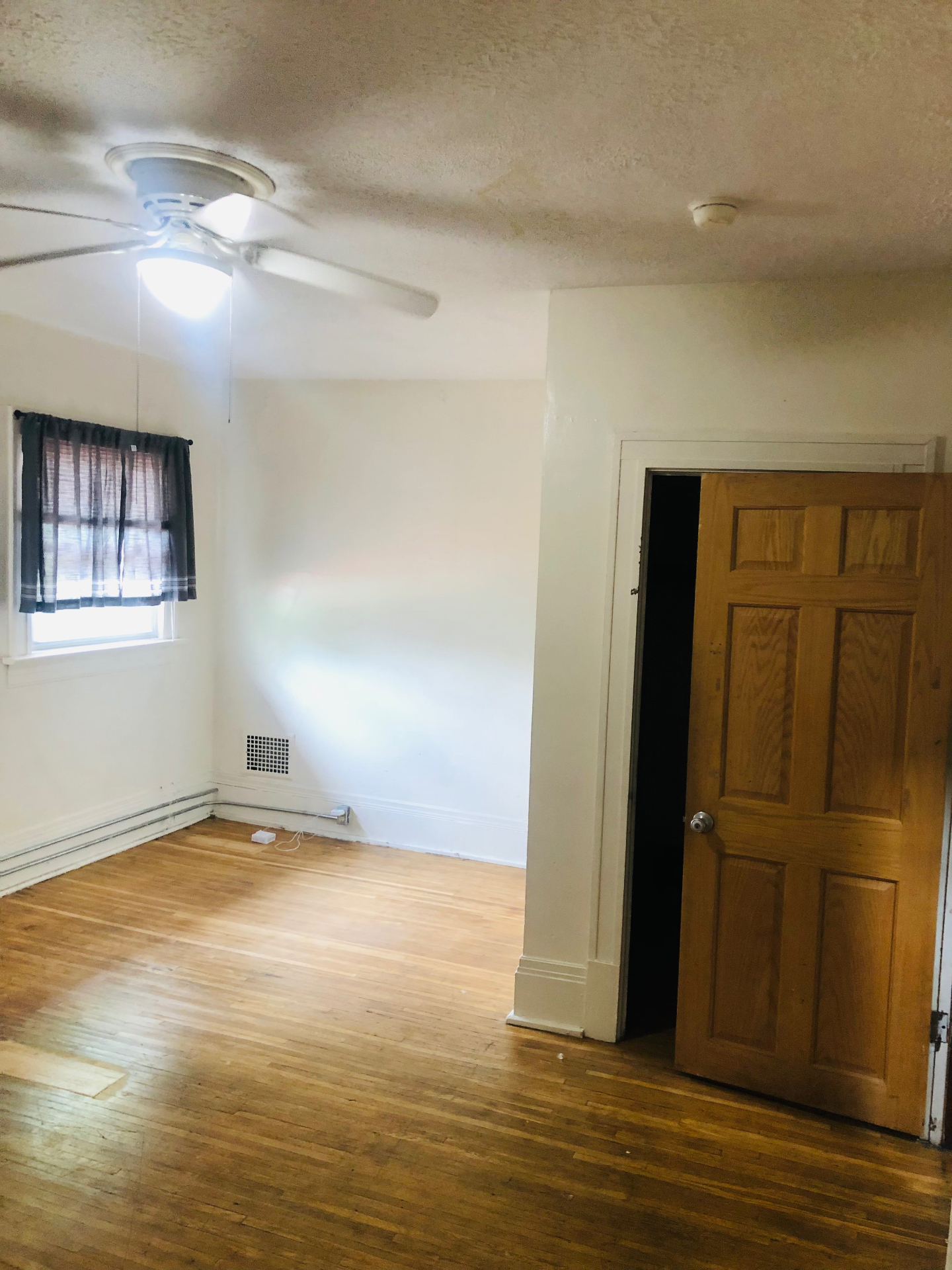 2005 Summit St. bedroom with hardwood floors and ceiling fan