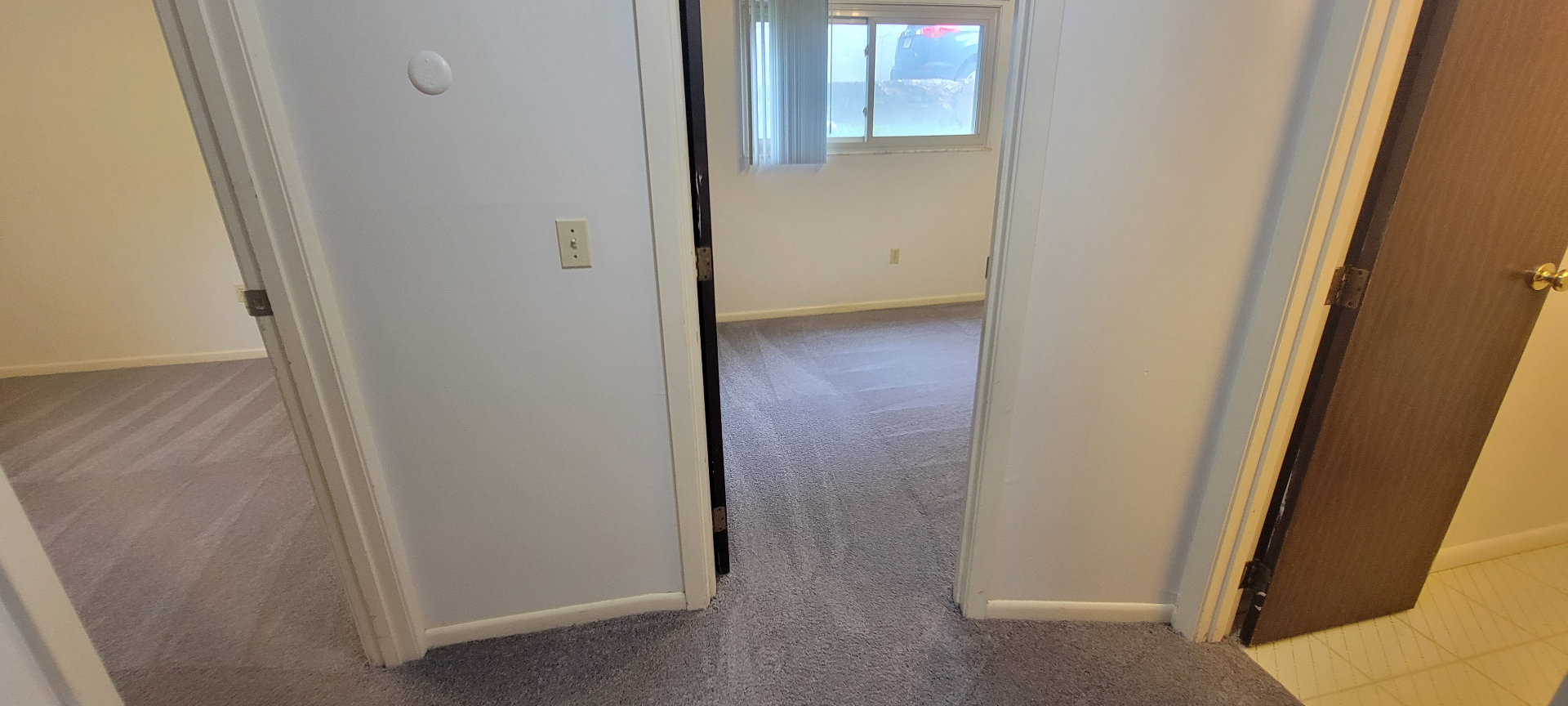 2024 Summit St. upper hall connecting bedrooms and bath with fresh carpet