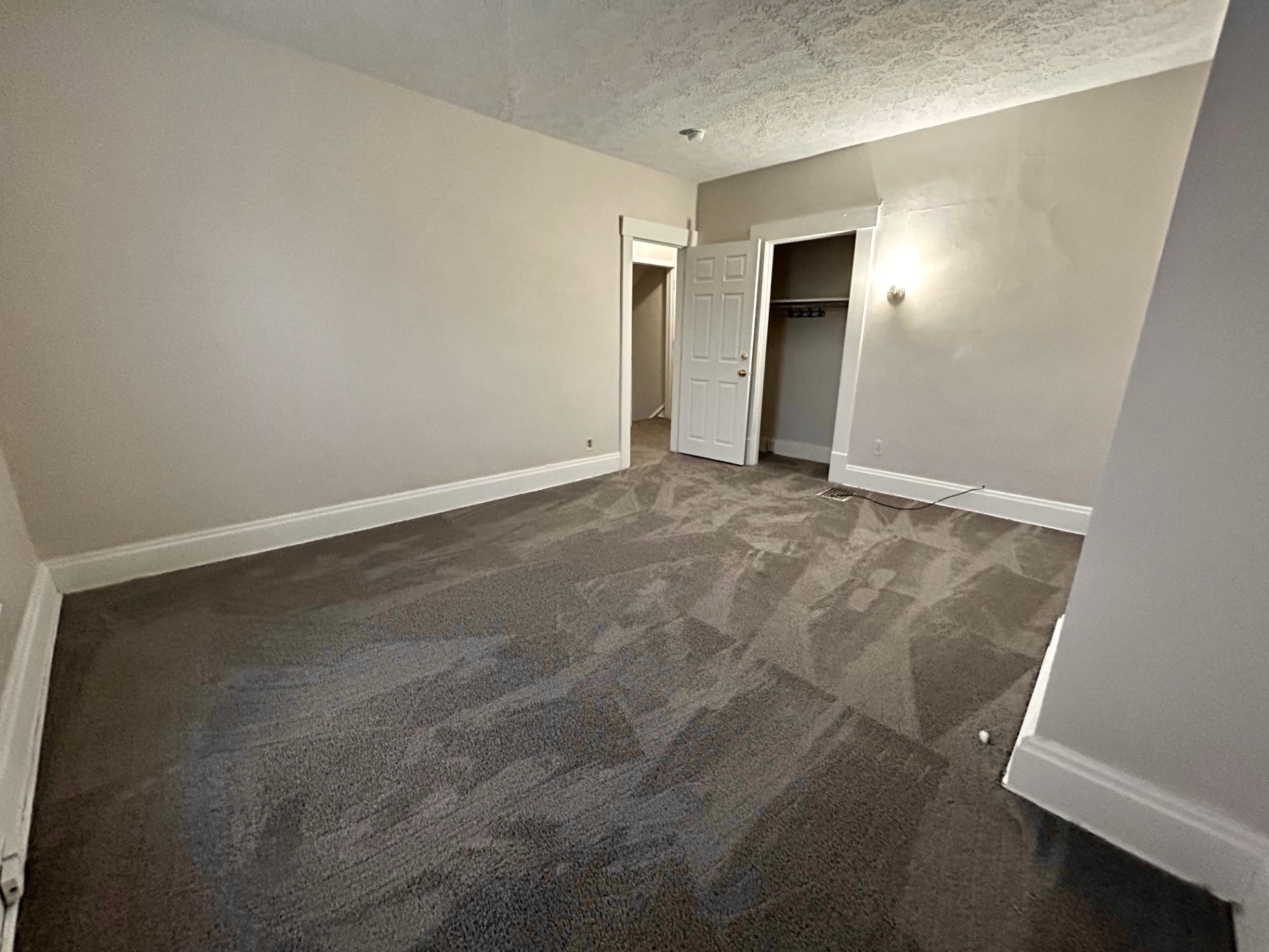 68 E Patterson Ave. bedroom with reach-in closet and adjoining hallway