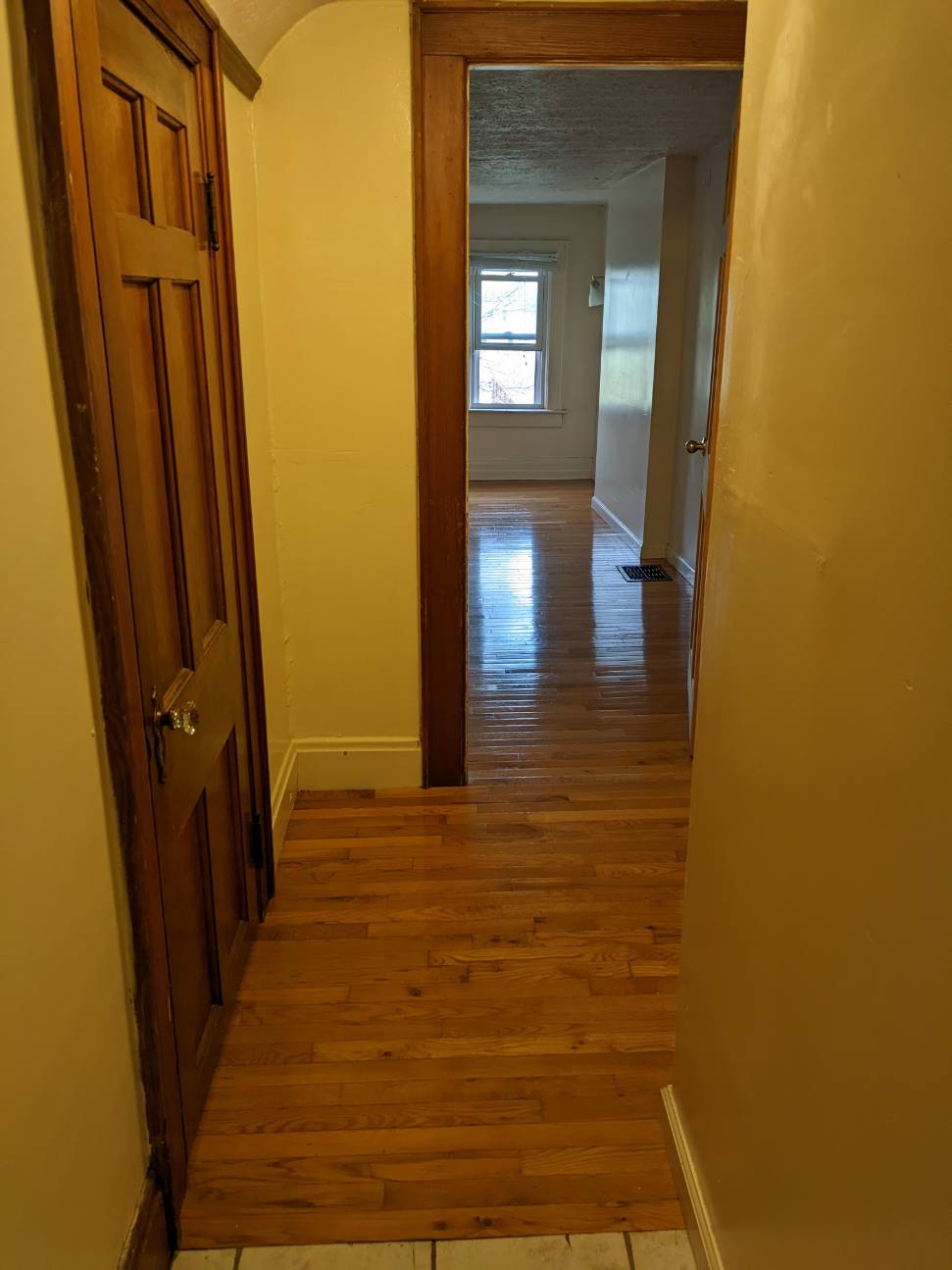 374 C E 14th Ave. interior hallway with refinished hardwood floors and wood doors