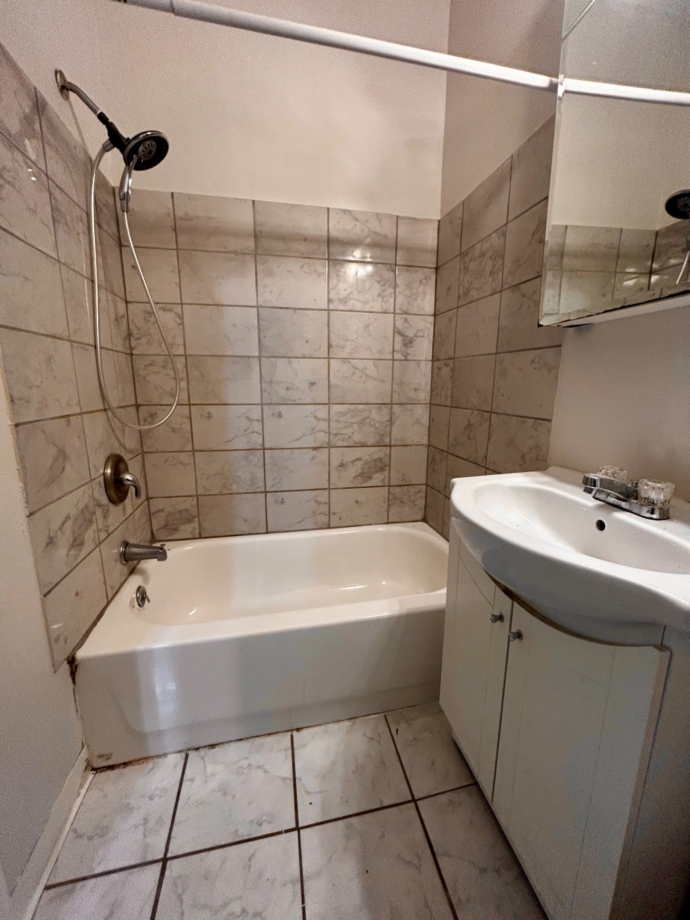 68 E Patterson Ave. second bathroom with tiled tub/shower and pedestal sink