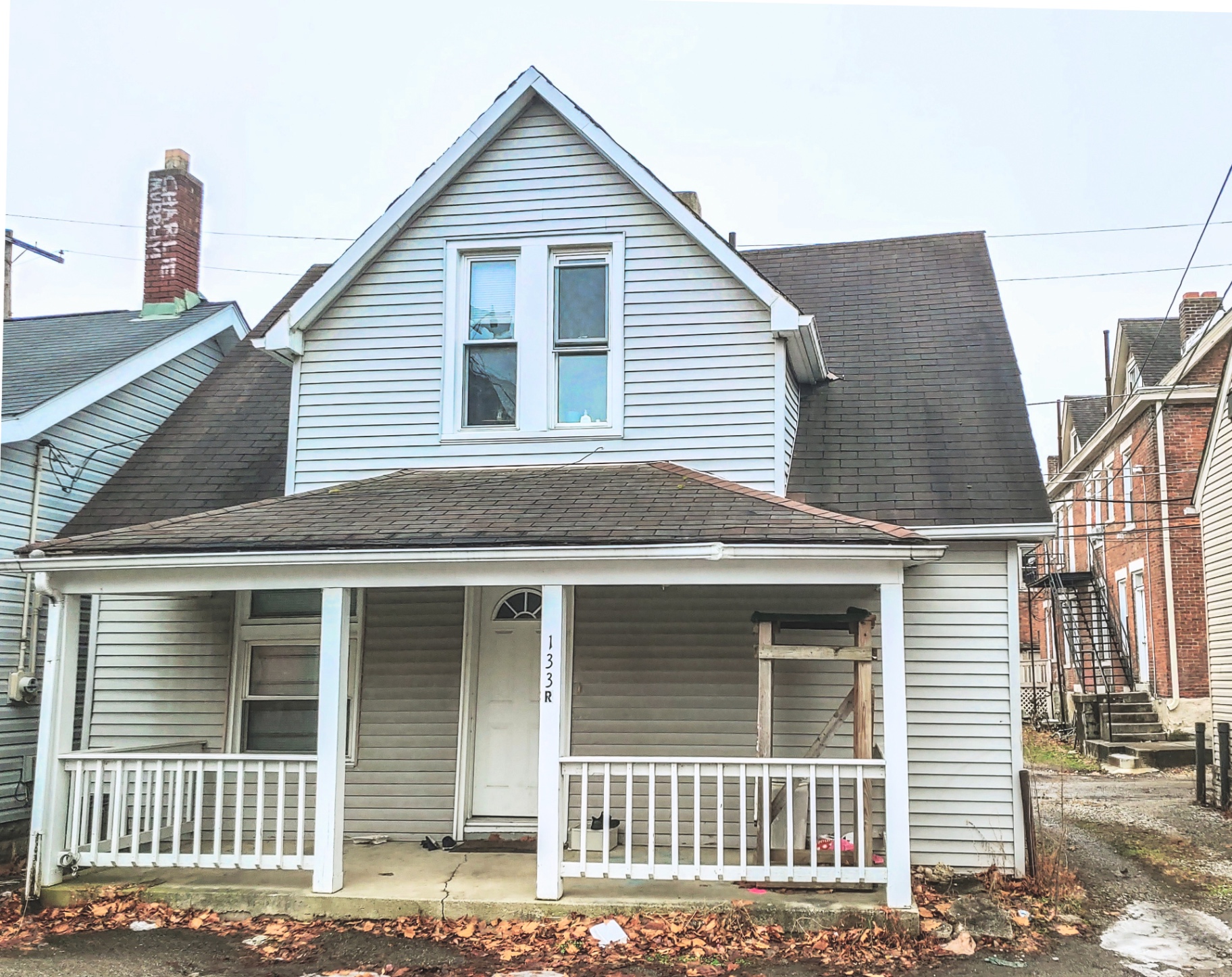 133R W 10th Ave. — rear unit exterior with covered front porch