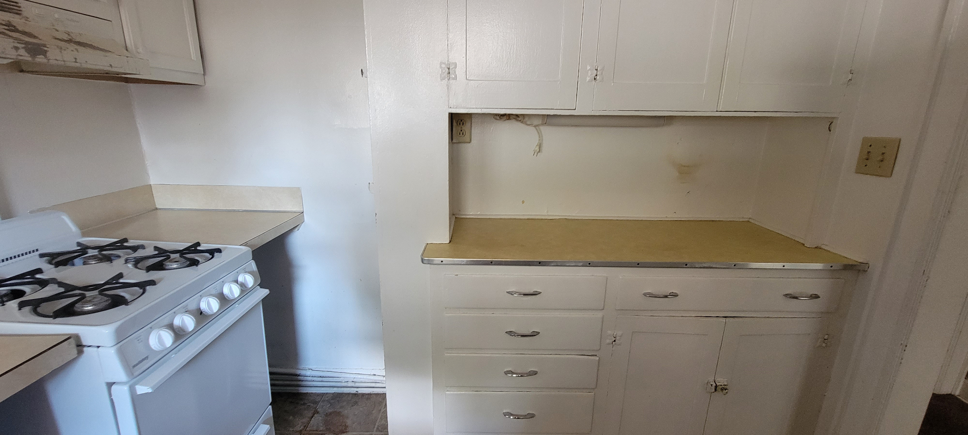 2044 Iuka Ave. D kitchen with abundant original cabinet and drawer storage