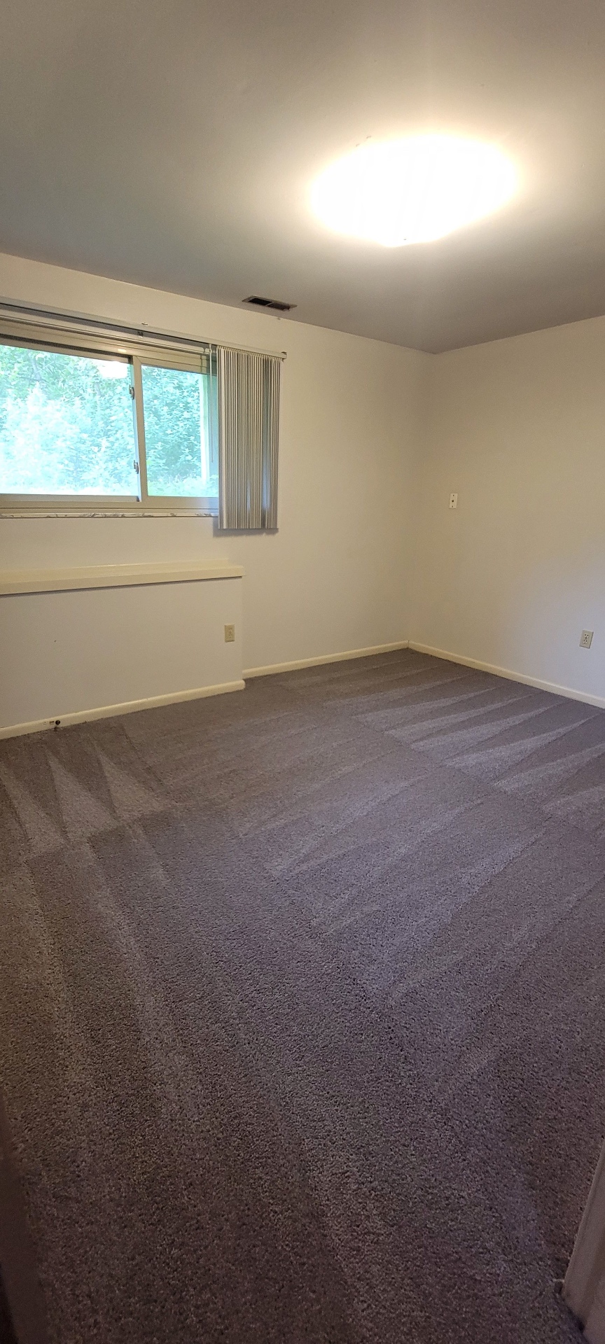 2024 Summit St. carpeted bedroom with window overlooking the ravine