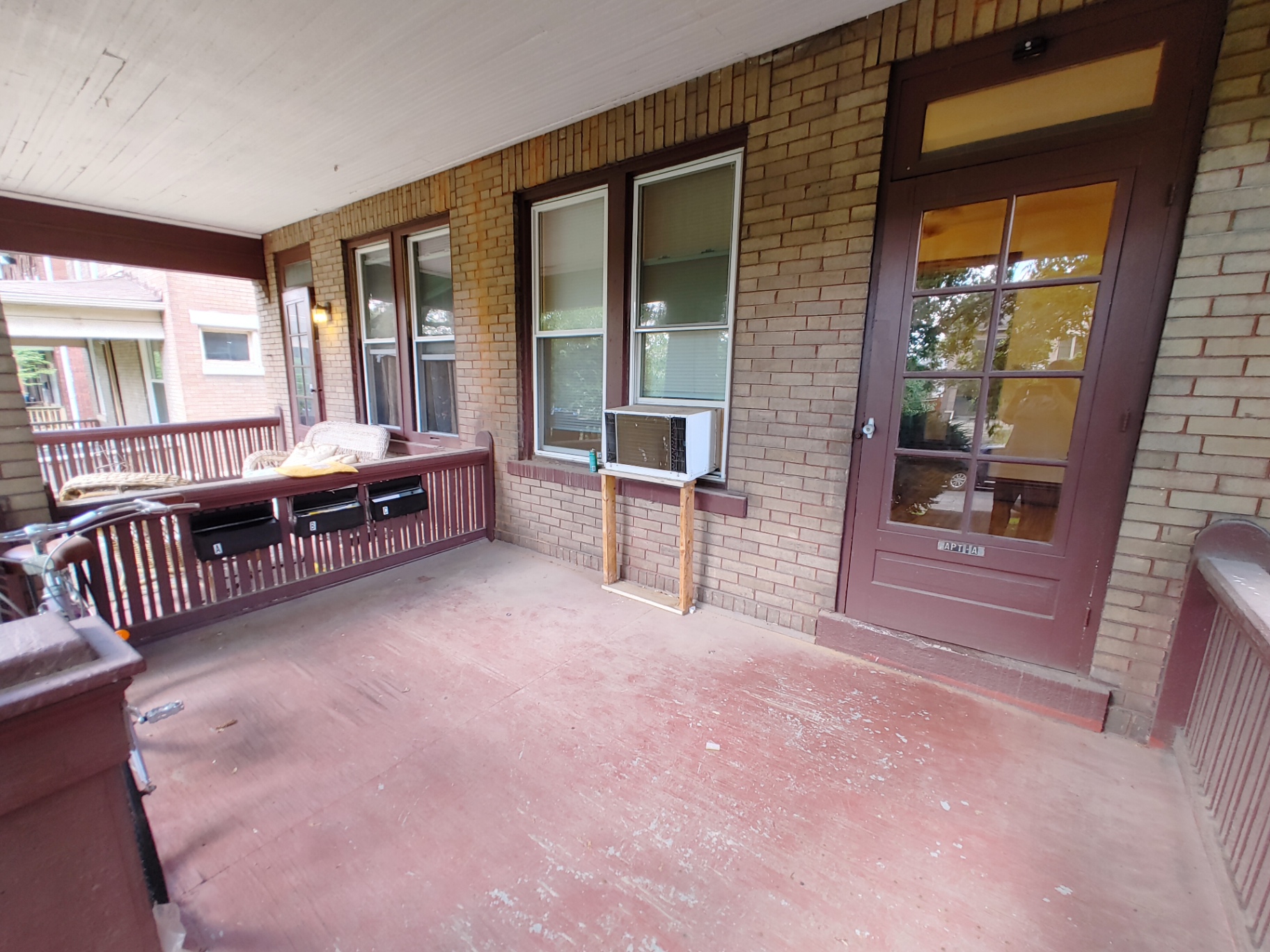 374 A E 14th Ave. covered front porch with brick columns and private entry door