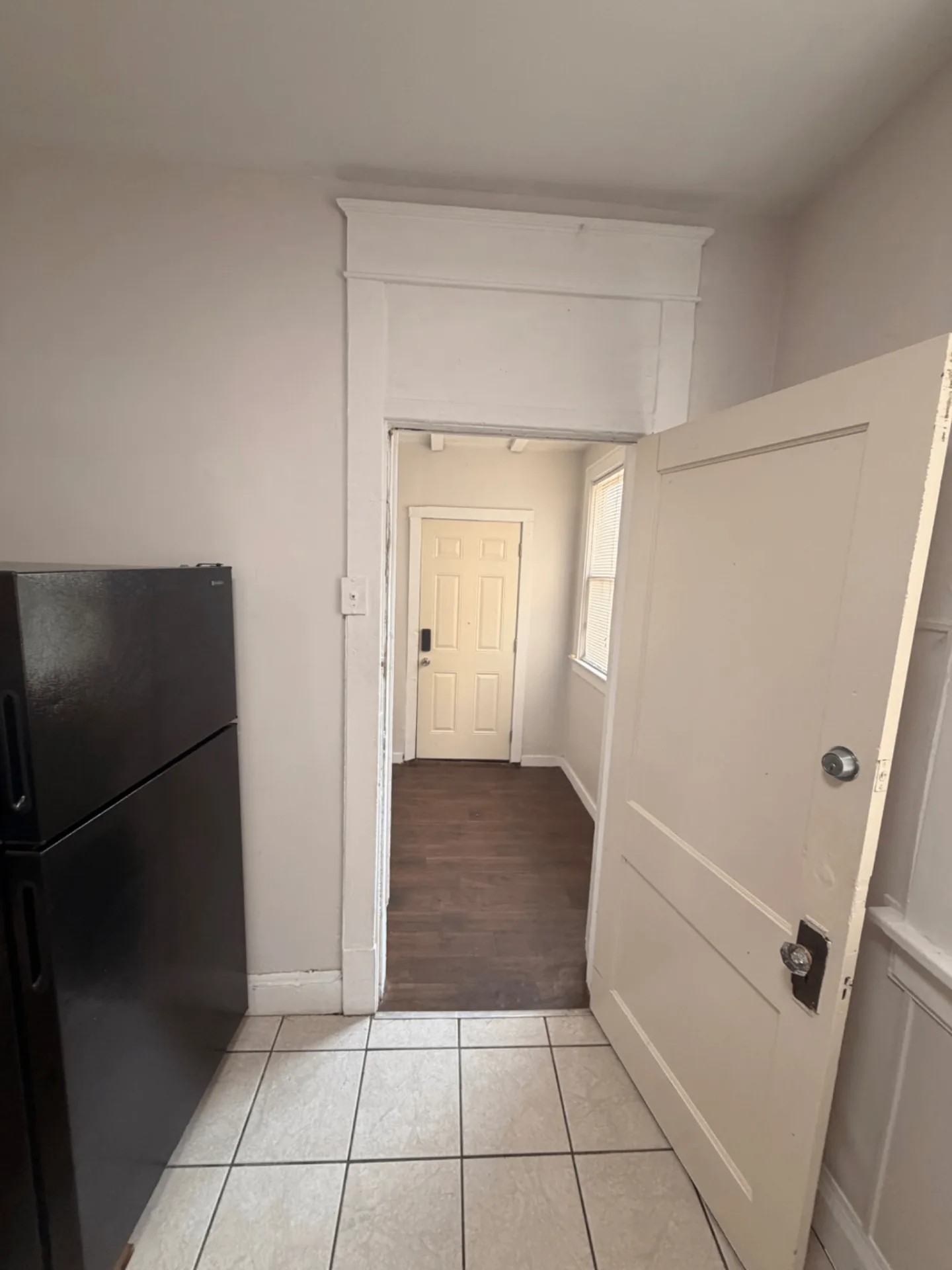 1816 Summit St. rear entry hallway leading to private back door