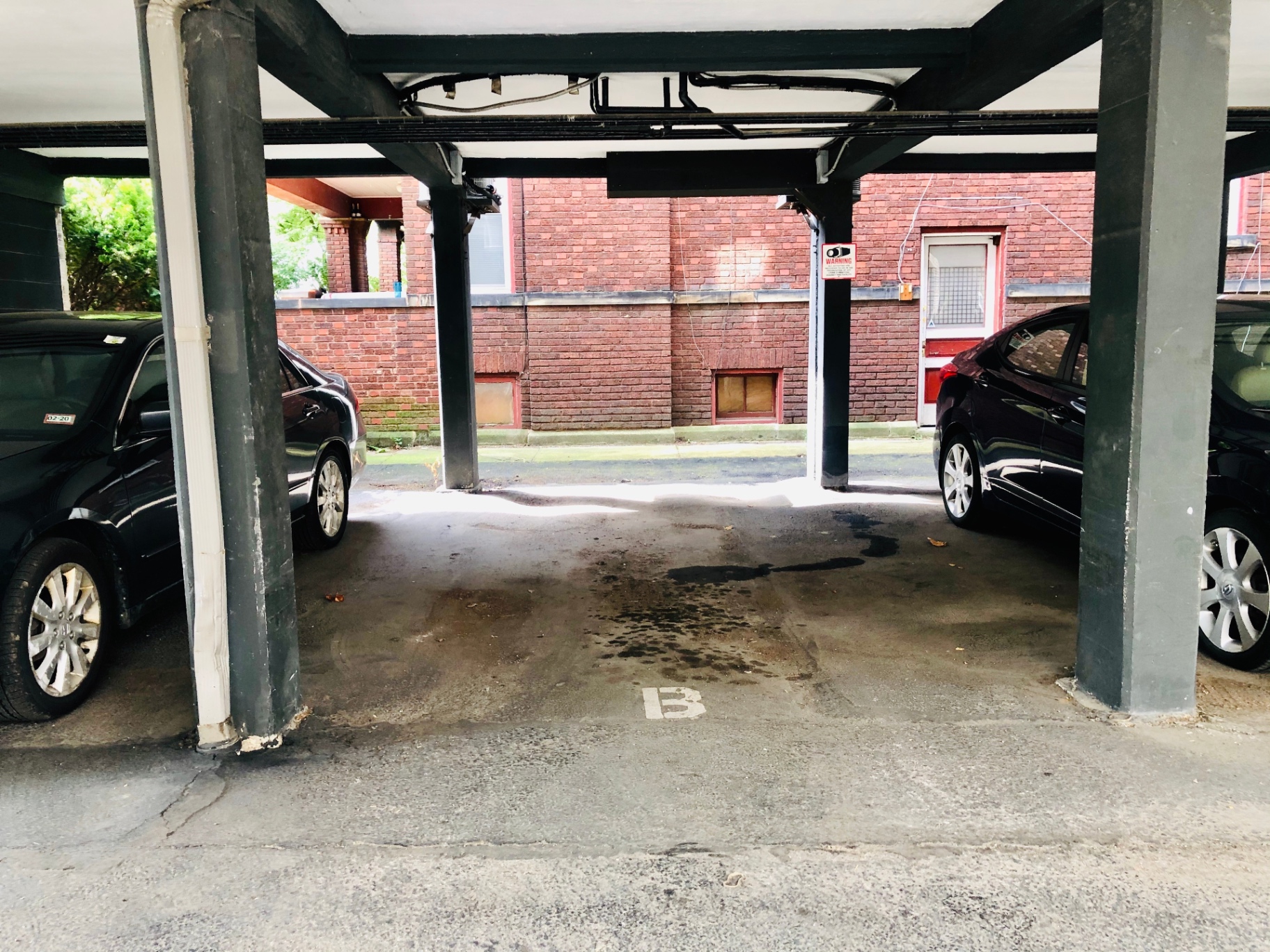 2011 Summit St. Unit A reserved carport parking space