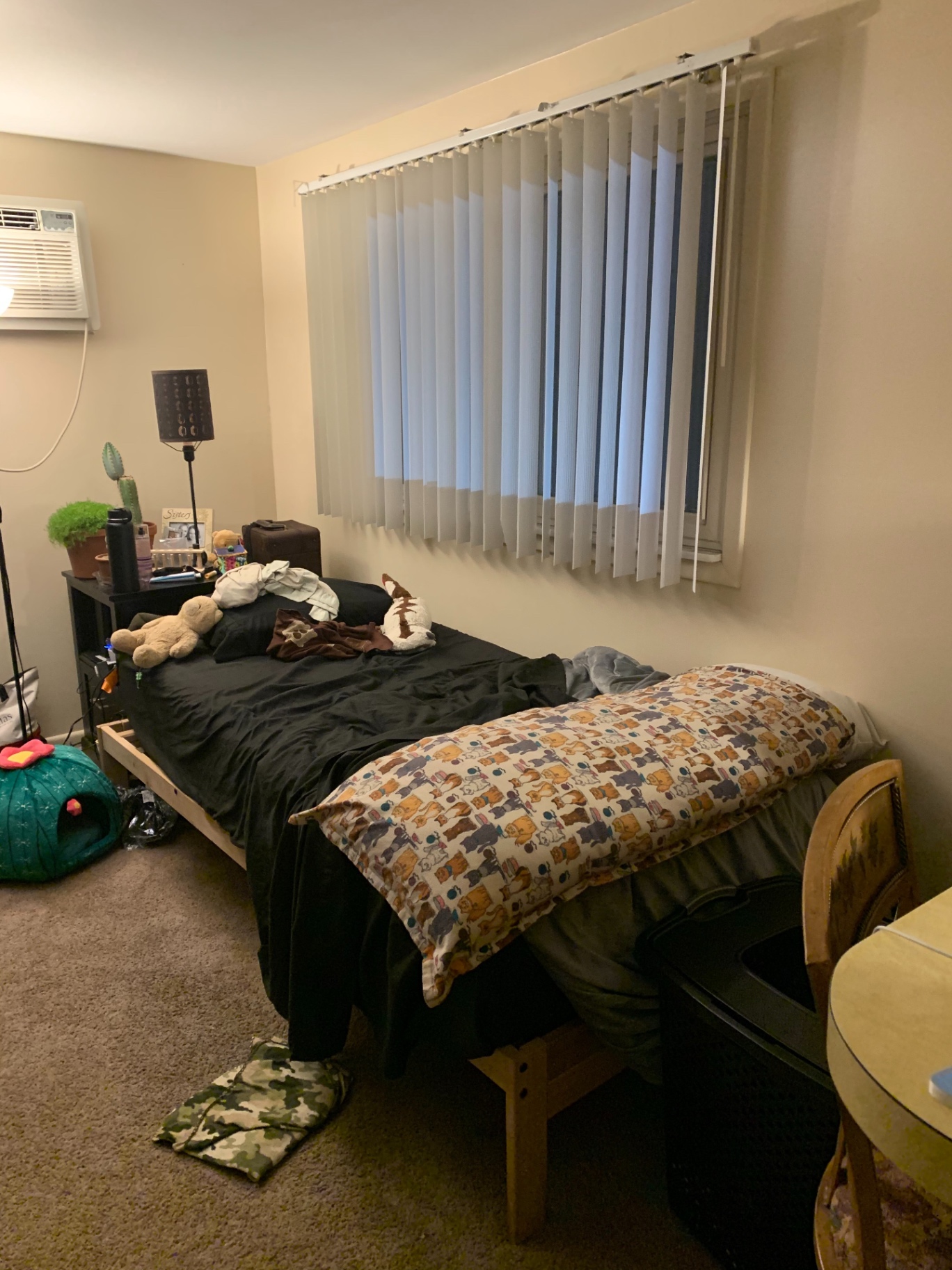 2030 Summit St Unit 1 bedroom with large window and vertical blinds