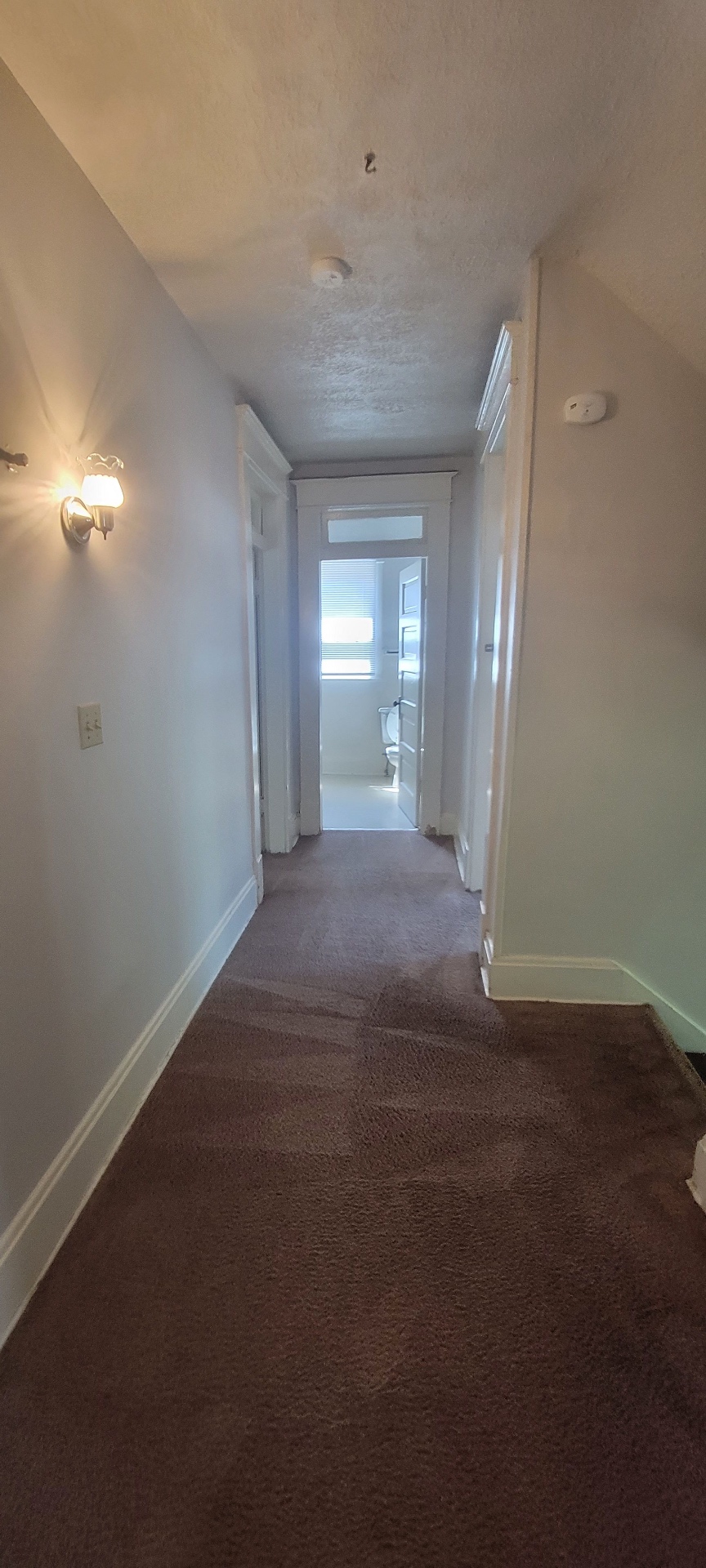 2015 Summit St. upstairs hallway leading to the bathroom and bedrooms