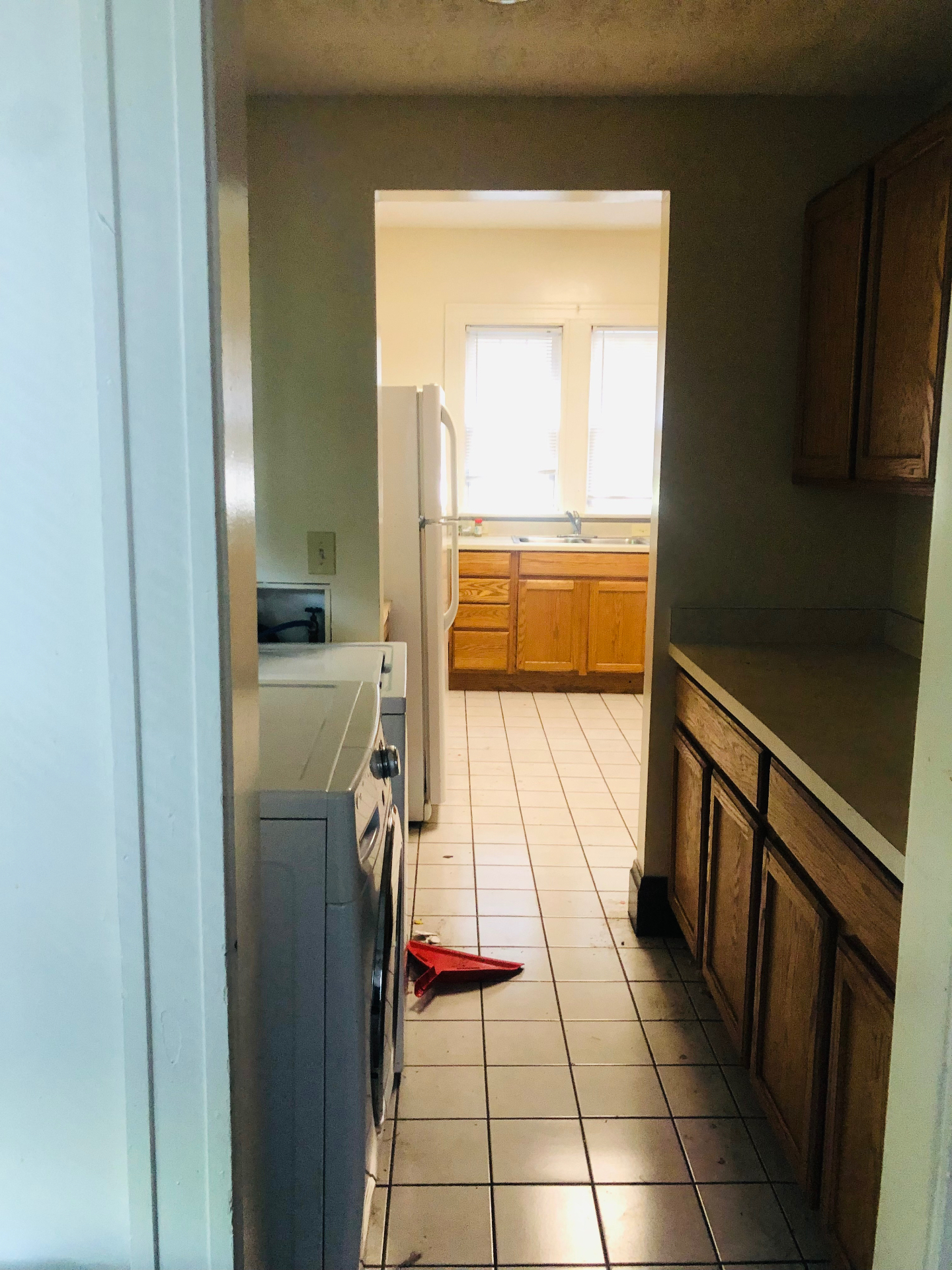 2005 Summit St. in-unit laundry area with washer and dryer just off the kitchen