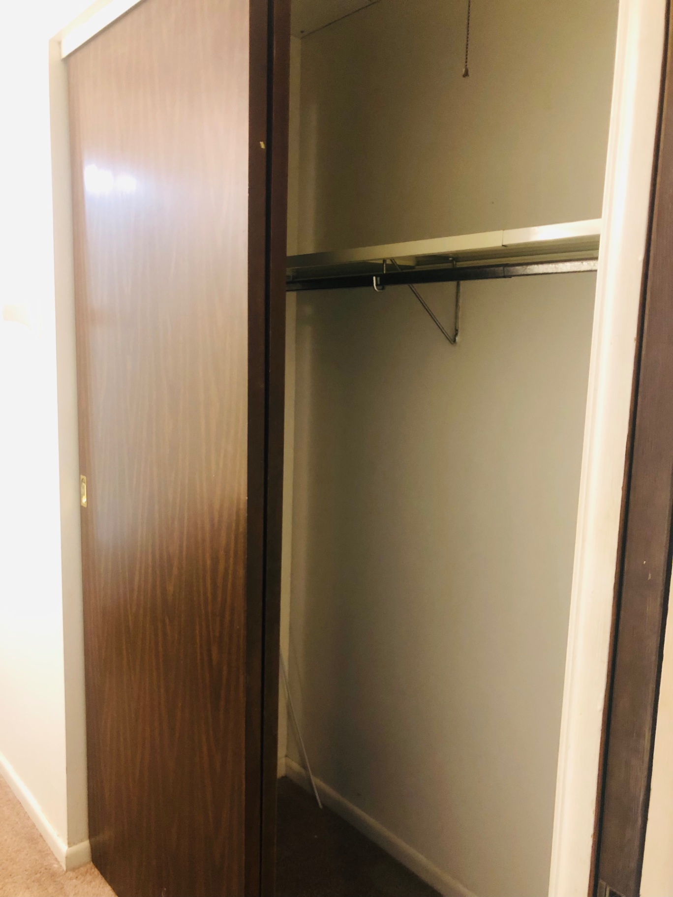 2028 Summit St. bedroom closet with hanging rod and shelf