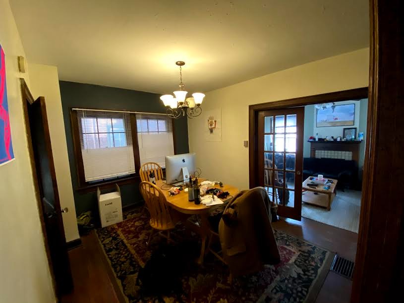 2054 Iuka Ave. B dining room with chandelier and French doors to the living room